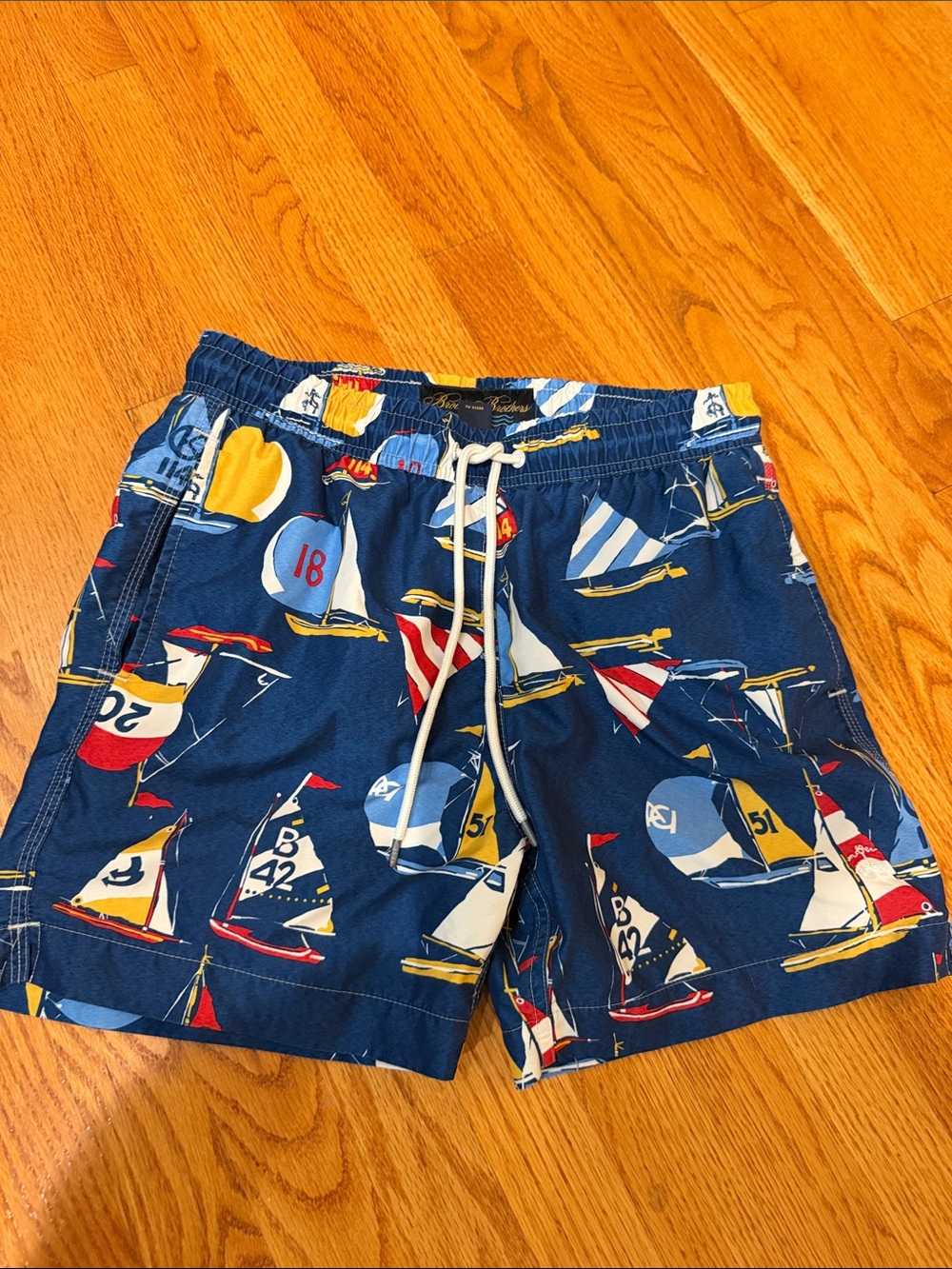 Brooks Brothers Navy Sailboat Print Swim Shorts with Red, Yellow & White Accents
